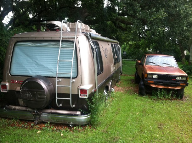 The most interesting portion of Gar Harris' front yard. That's one of the few front-wheel drive RVs in existence, and damn if he's not fixing it up for a future road trip/tour. Not pictured: his motorcycle.